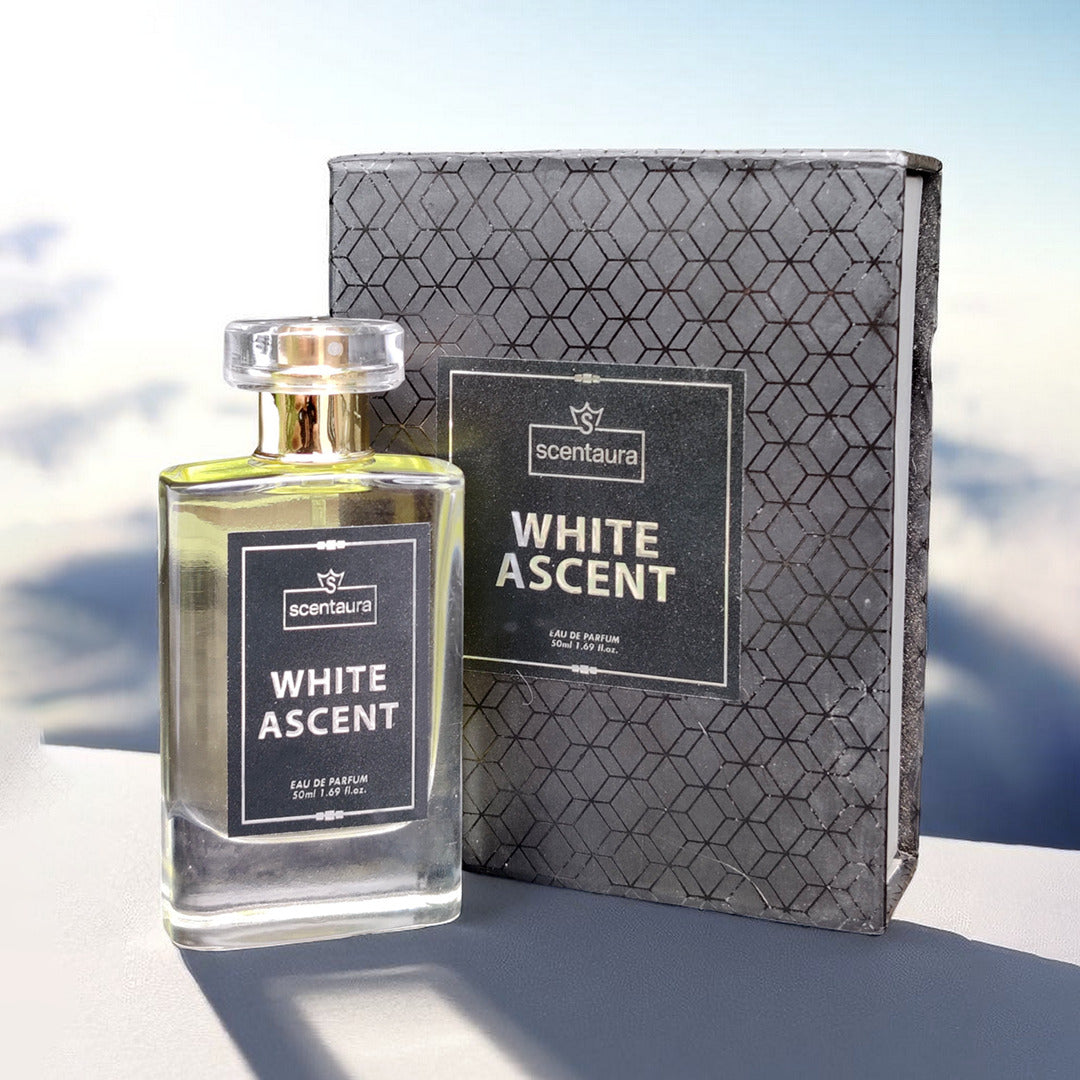 Perfume bottle and packaging of 'White Ascent' by Scentaura on a reflective surface with blurred background